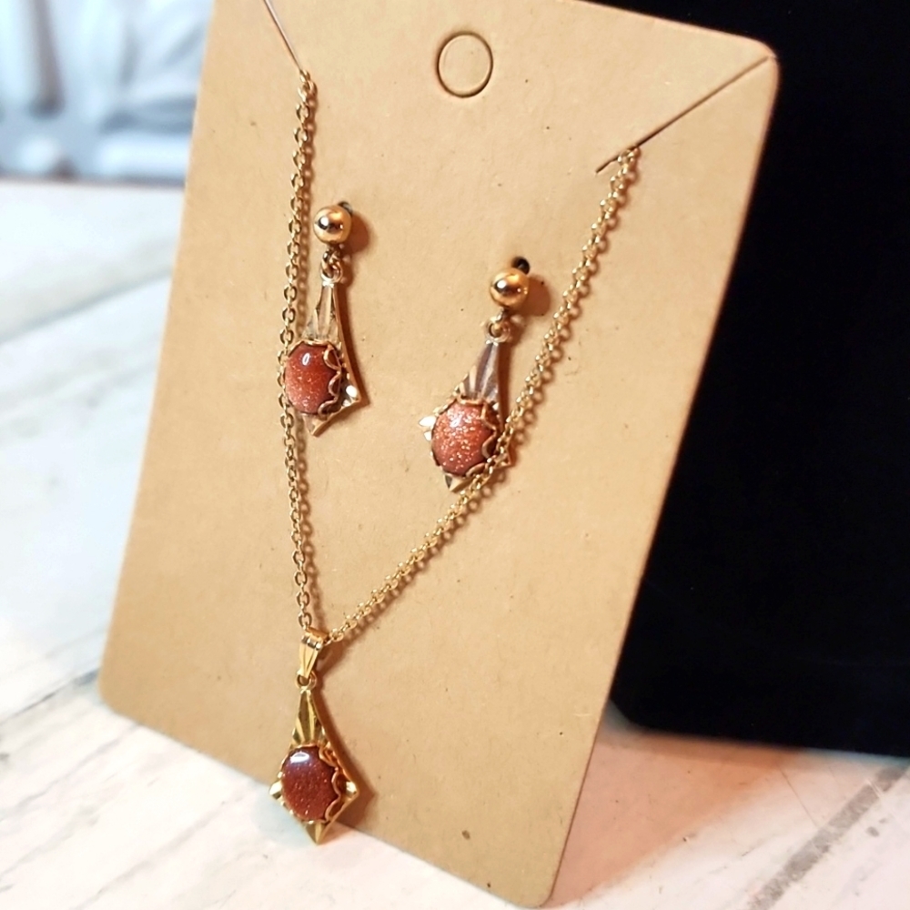 VTG Gold Tone Avon Etched Charm With Goldstone Cabochon with matching earrings